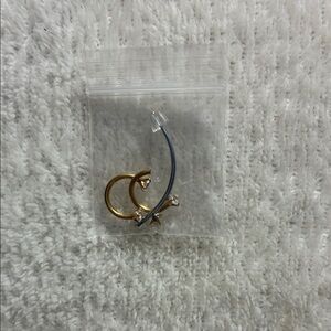 Nose rings (2-pack) with tool applicator .
